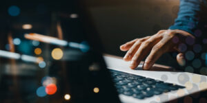 Person using trackpad on laptop